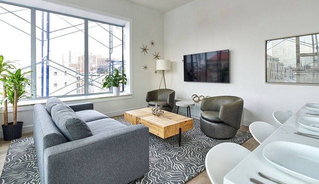 Bright Designer Loft – steps from PATH to NYC