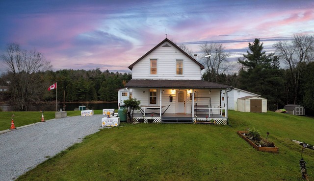 Cottage in Ardoch North Frontenac Ompah fishing boat ruffed deck dock solarium