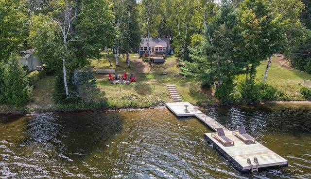 Dog-friendly Lakefront Cottage w/Hot Tub + WiFi + Firepit + Games + Near Trails