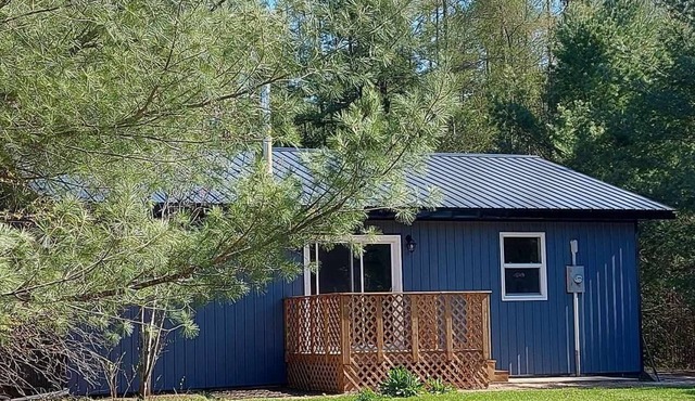 Escape the City and Embrace all Nature has to Offer at This Remodeled House