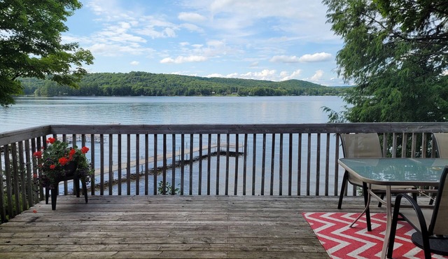 Family waterfront cottage with shallow, sandy entry - drive in, road access.