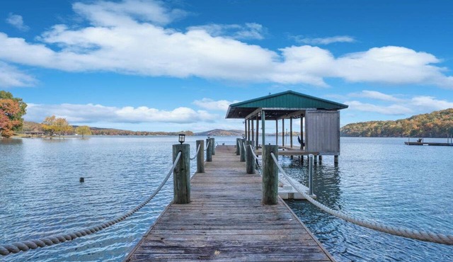 Flat access - covered boat slip with dock-two car garage - year round water
