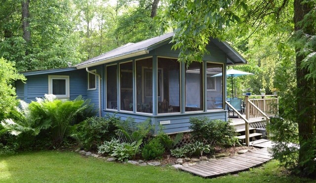 Get away at this quaint cottage tucked behind a beautiful fern bed.