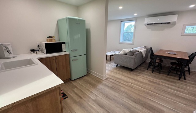 Golden Acre Suites | 2BR Downtown w/Exposed Brick & Retro Retreat