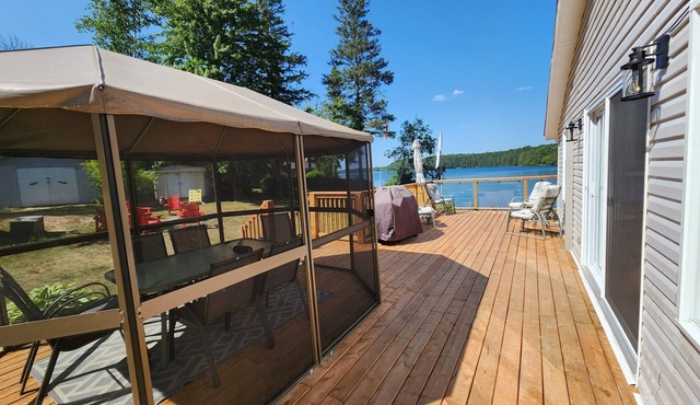 Incredible view of the lake everywhere with sandy beach!