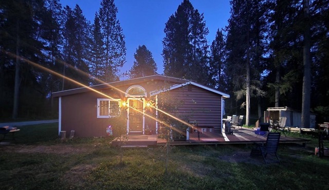 Kozy cabin in the woods with a hot tub and woodstove.