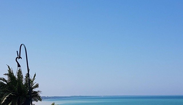 Lakefront Beach House w/Hot Tub, Private Sandy Beach & Stunning Sunsets