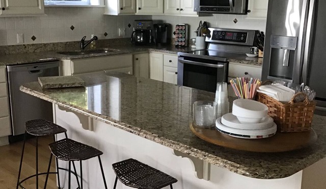 LAKEFRONT condo beach level -Sleeps 8 indoor pool.