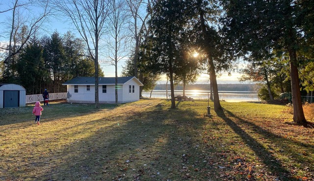Lakefront Cottage Retreat w/Private Dock, Paddle Boards, Fire Pit, Sunset Views