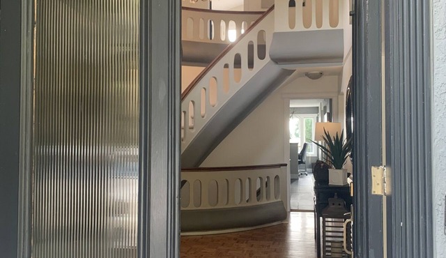 Lovely upper home in fabulous location steps to sandy beach ocean views