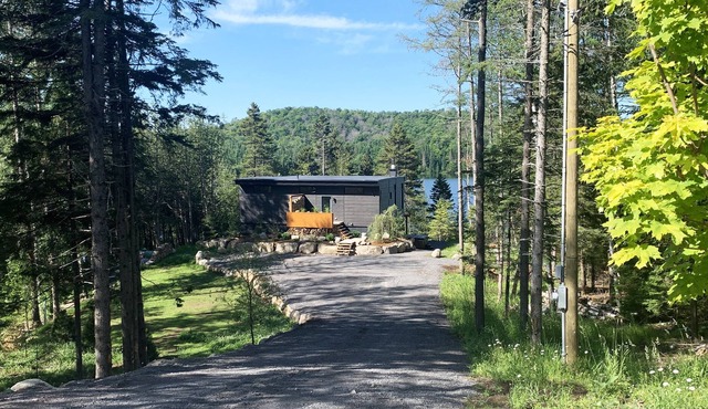 Luxury lakefront cabin. Modern design + hot tub