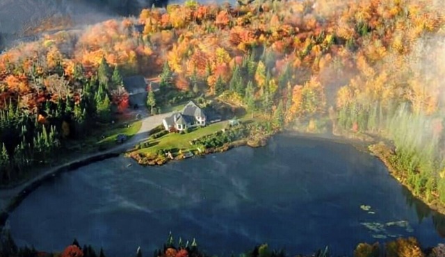 Luxury four bedroom family retreat with private lake, 4km of trails, on 37 acres