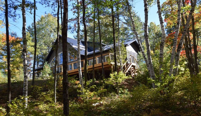 Luxury lakefront Home on private wooded 90Acres