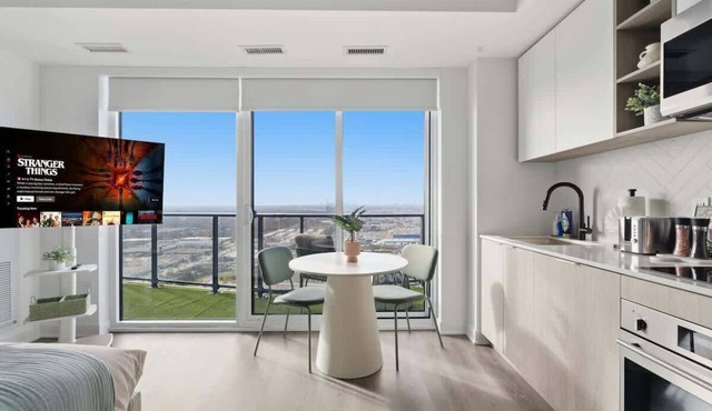 Modern Etobicoke Studio Sleek Queensway Retreat in Toronto