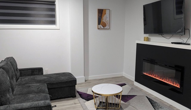 President's Choice: Spacious 1-Bedroom Basement Suite with Fireplace