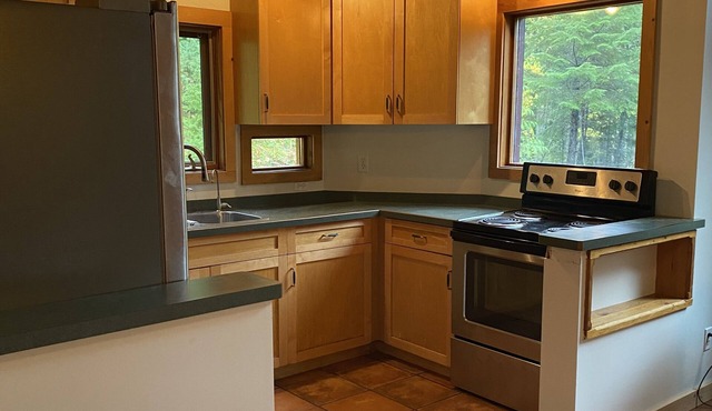 Private Mossy Mountain Suite nestled in the forest by Kootenay Lake