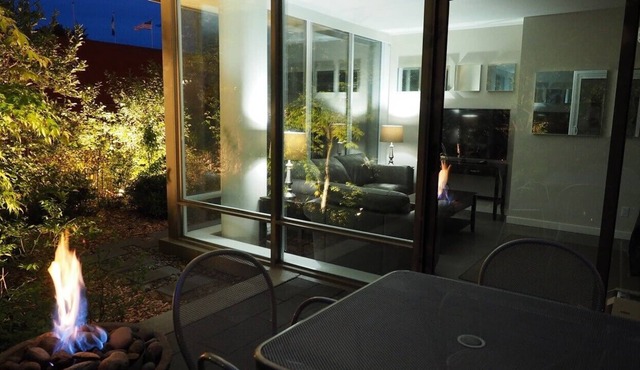 Private patio with gas fire-pit, trees & tranquil ponds