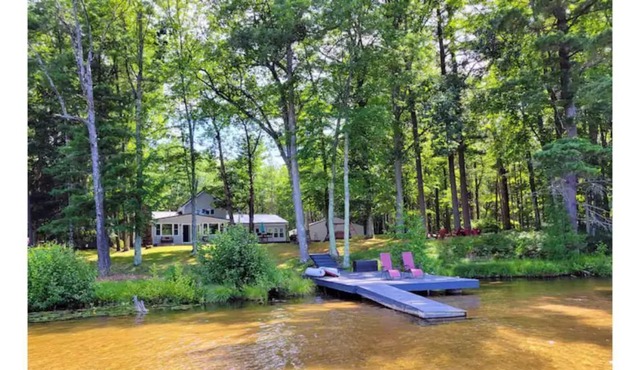 Rapid River Retreat riverfront close to Torch Lake