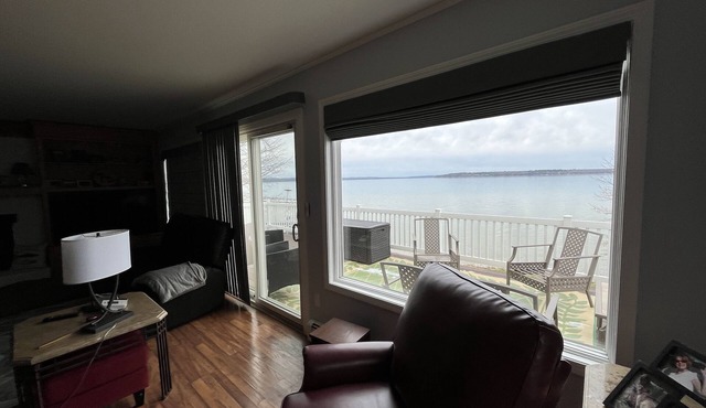 Rare Find - Burt Lake home with sunset views