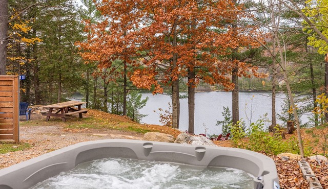 Rarely offered 2 waterfront cottages with 2 hot tubs side by side!