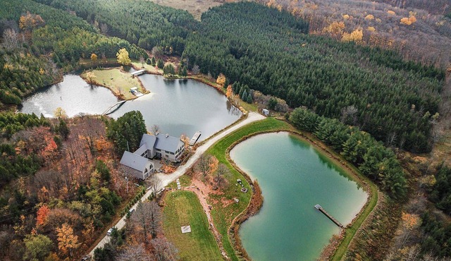 Secluded luxury on 46 acres of pristine land with 2 acres of spring fed water