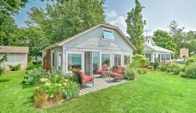 Serene Lakeside living! A charming three bedroom one bath cottage