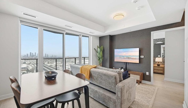 Sleek 2BR Condo with Balcony & Skyline Views