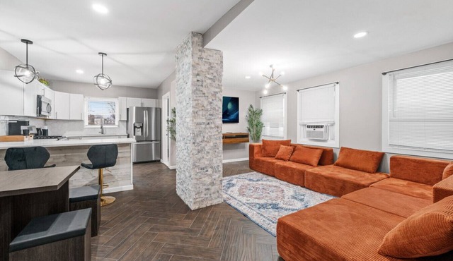 Steps from the train, minutes to NYC, sleeps 24 in style