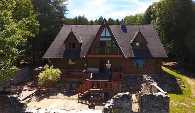 Stunning Log Home on a Private Lake