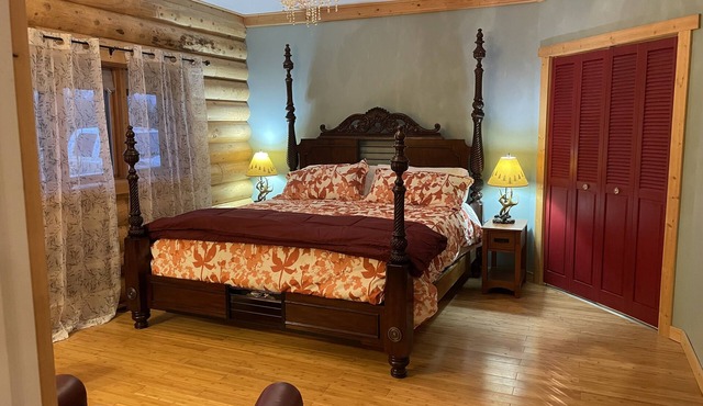 The Canada Goose Lodge . Cozy up by the fire in this secluded Log Lodge.