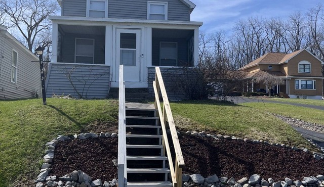 This Quaint home overlooking Cayuga Lake is the perfect Finger Lakes Getaway!