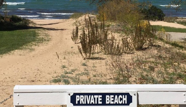 Unique property with main cottage, guest house and private beach access.