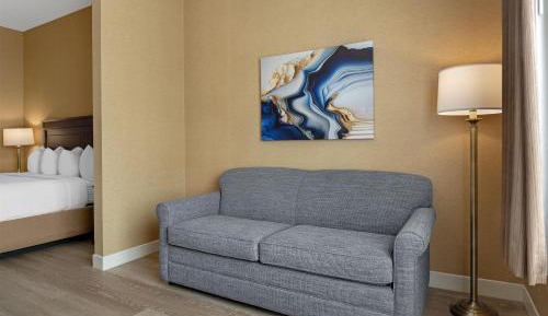 King Suite with Sofa Bed, Fireplace, Sitting Area and Rain Shower - Non-Smoking