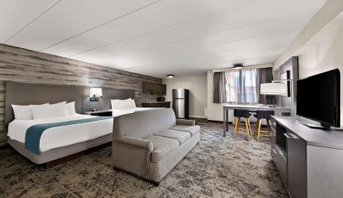 Queen Suite with Two Queen Beds, Sofa Bed, Kitchenette and Walk-In Shower - Non-Smoking
