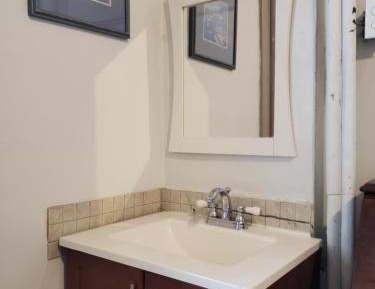 Triple Bunk with Shared Bathroom 