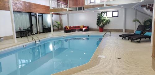Queen Suite with Two Queen Beds and Pool View - Non-Smoking