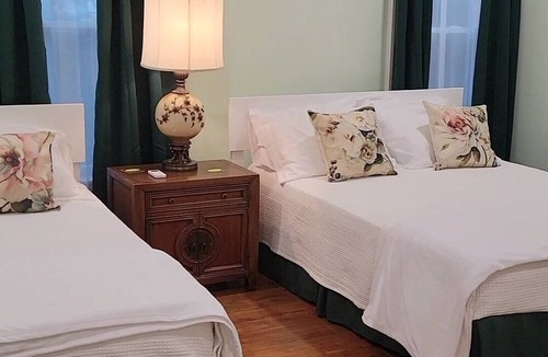 Titusville Bed & Breakfast | Great solar eclipse viewing! Beautiful room, 2 queen beds & private bath.