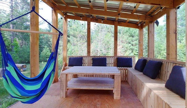 Chalet en bois rond du Caribou | Spa et Riviere