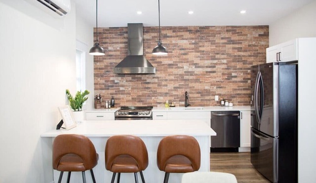 This 2 bedroom loft-like apartment is perfect for your visit to downtown Fredericton